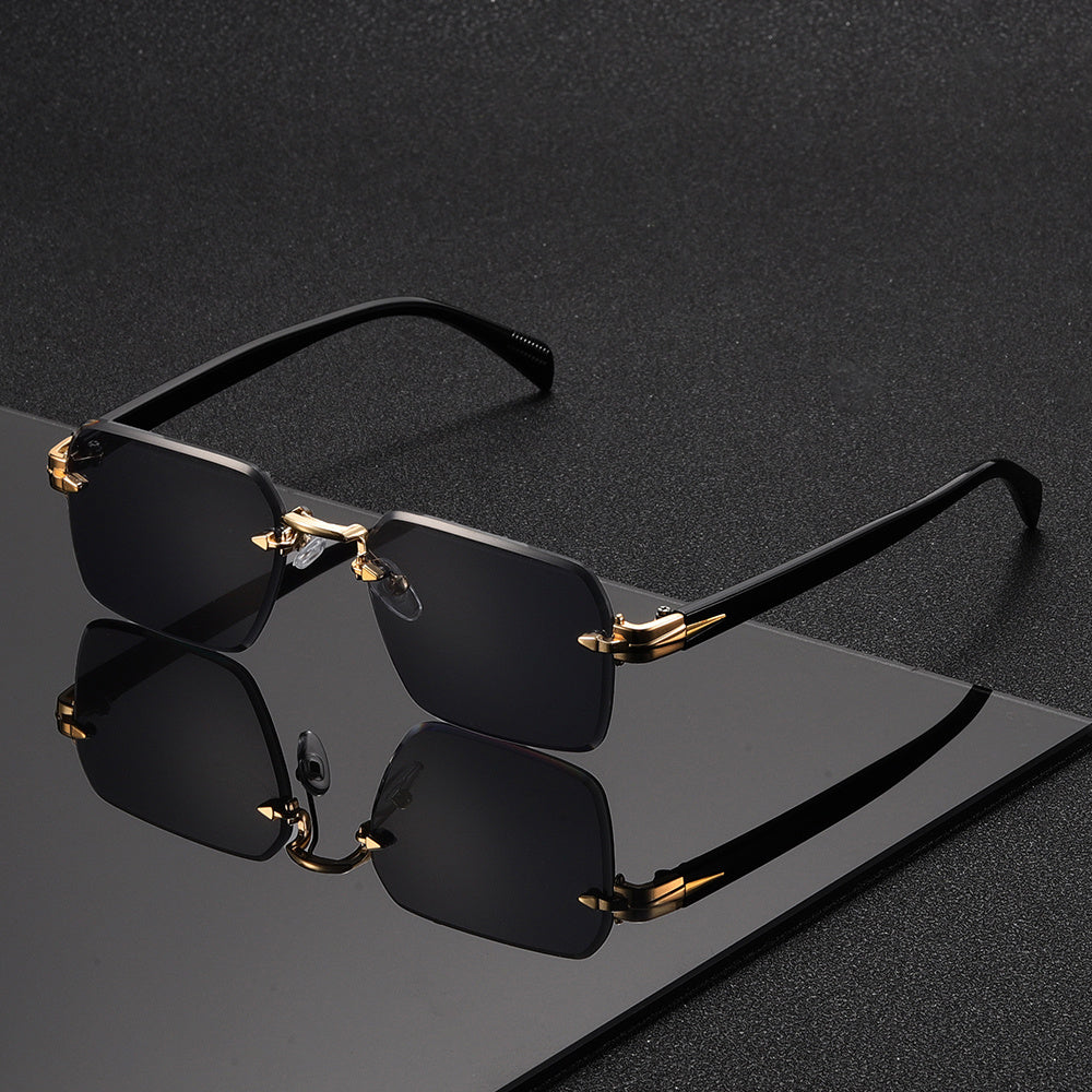 Elegant square rimless glasses for men with a sophisticated gold metal frame.