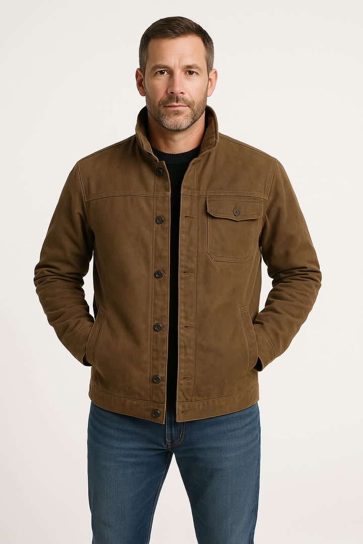 Men's rugged brown utility jacket for autumn outdoor adventures, featuring practical pockets & durable outerwear.