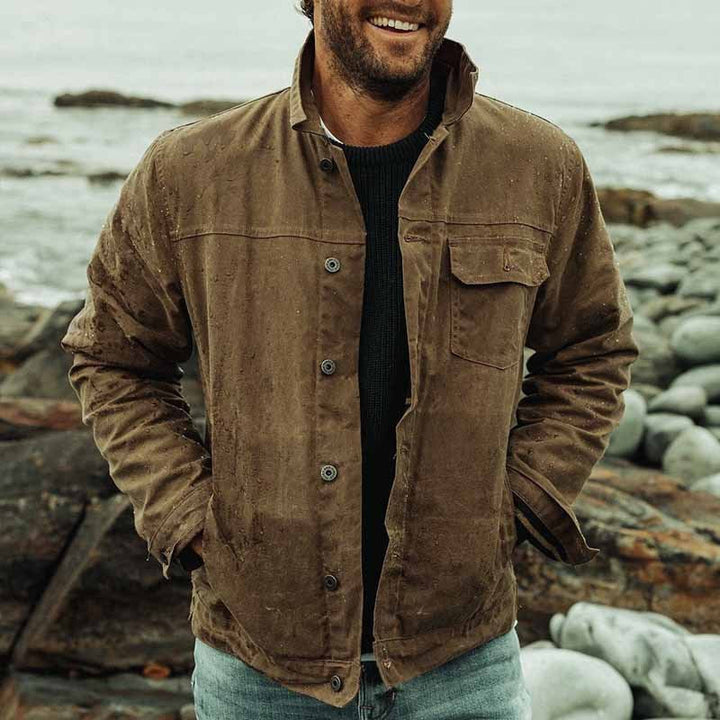 Versatile men's utility jacket, perfect for fall fashion. Rugged brown outerwear with practical design for casual style.
