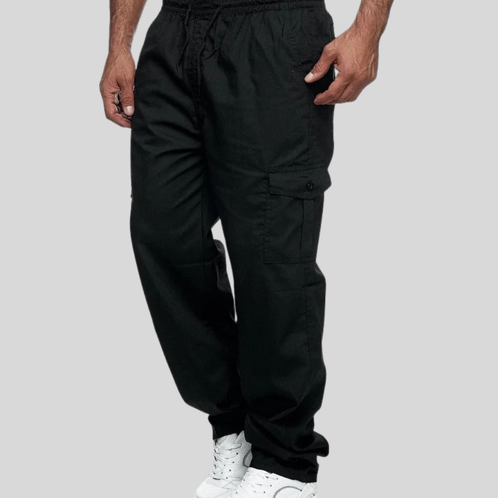 Men's rugged outdoor cargo pants, durable multi-pocket design for hiking & tactical adventure. Straight leg fit.