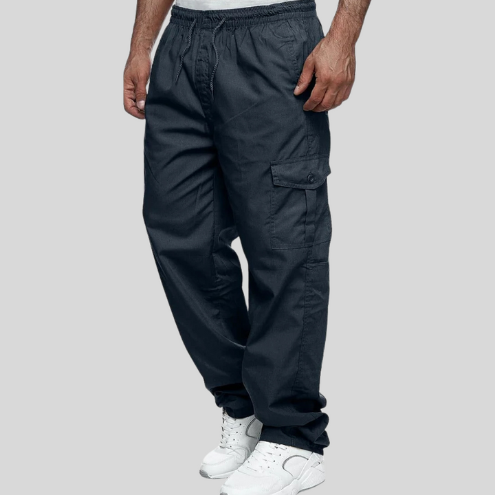 Multi-pocket men's activewear cargo pants, durable & comfortable for outdoor adventures, hiking, or utility work.