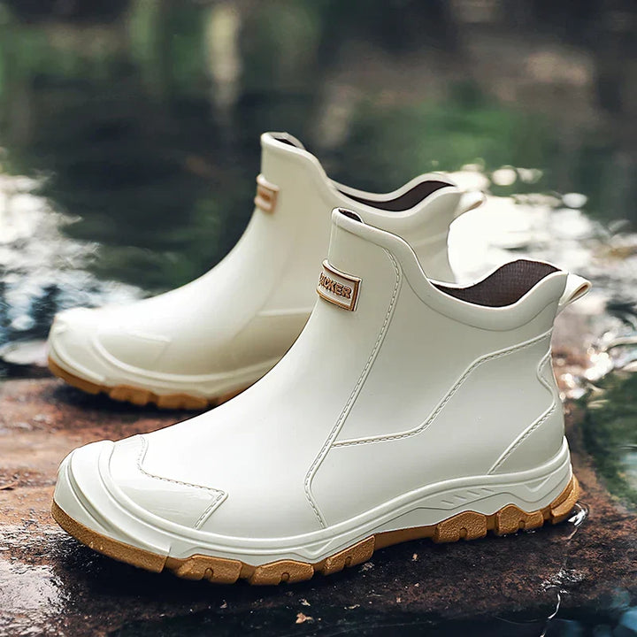Anti-slip men's rugged waterproof ankle boots, designed for challenging outdoor terrain.