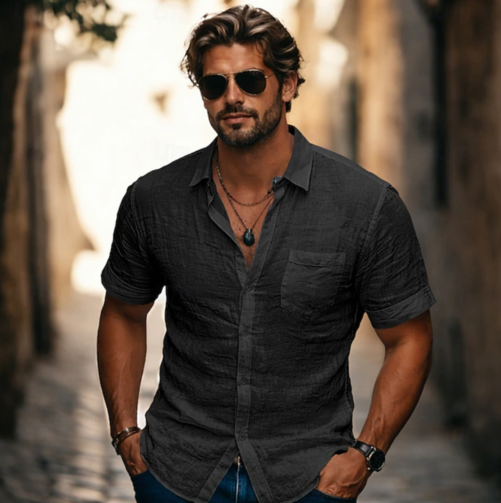 Versatile men's short sleeve button-down for summer, holidays, or warm weather.