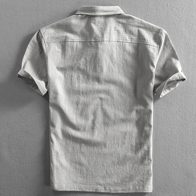 Soft knit men's short sleeve polo shirt, a breathable top designed for effortless warm weather and relaxed comfort.