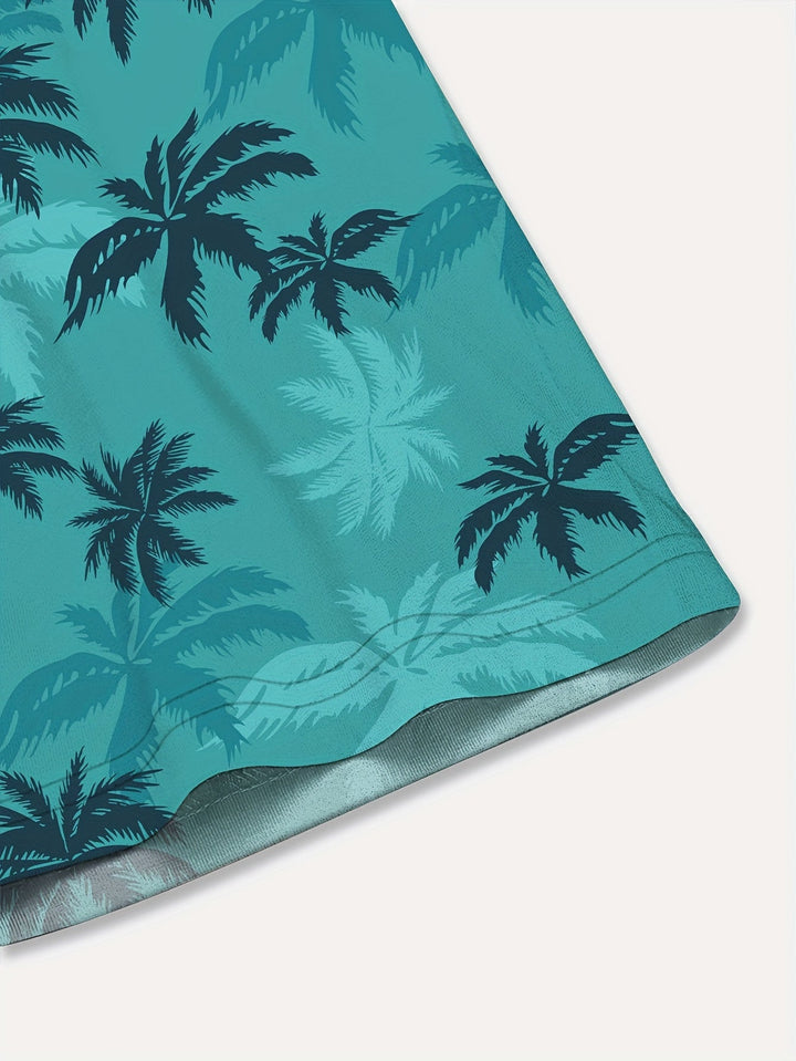 Lightweight men's short sleeve shirt featuring a tropical palm tree print, perfect for beach.