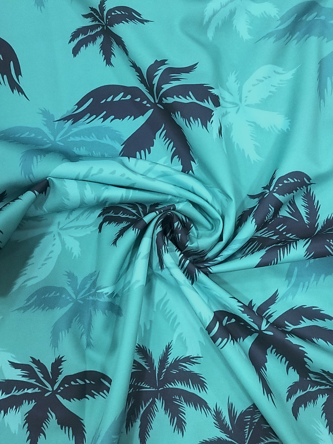 Casual men's summer fashion: short sleeve shirt with a fun tropical palm tree print.