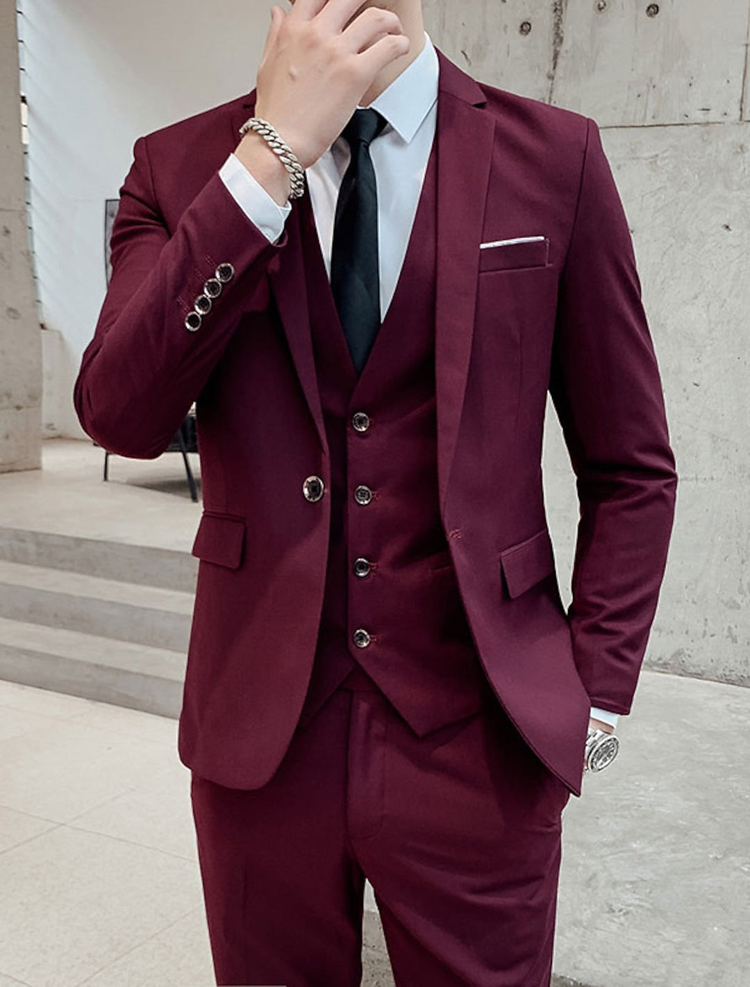 Men's single-breasted 3-piece suit with a two-button jacket, ideal for formal events and business attire.
