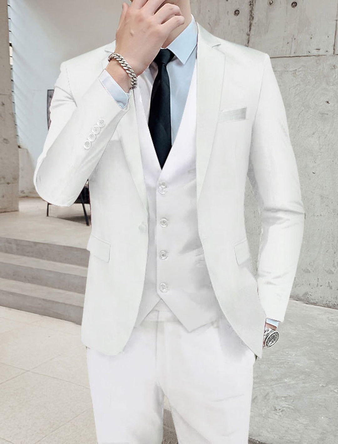 Modern fit men's 3-piece single-breasted suit, two-button style, offering elegant formal wear for business and events.