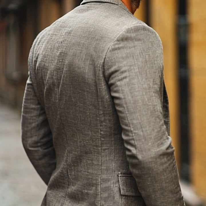 Relaxed fit men's single-breasted blazer. Smart-casual jacket, lightweight & versatile for everyday spring/autumn fashion.