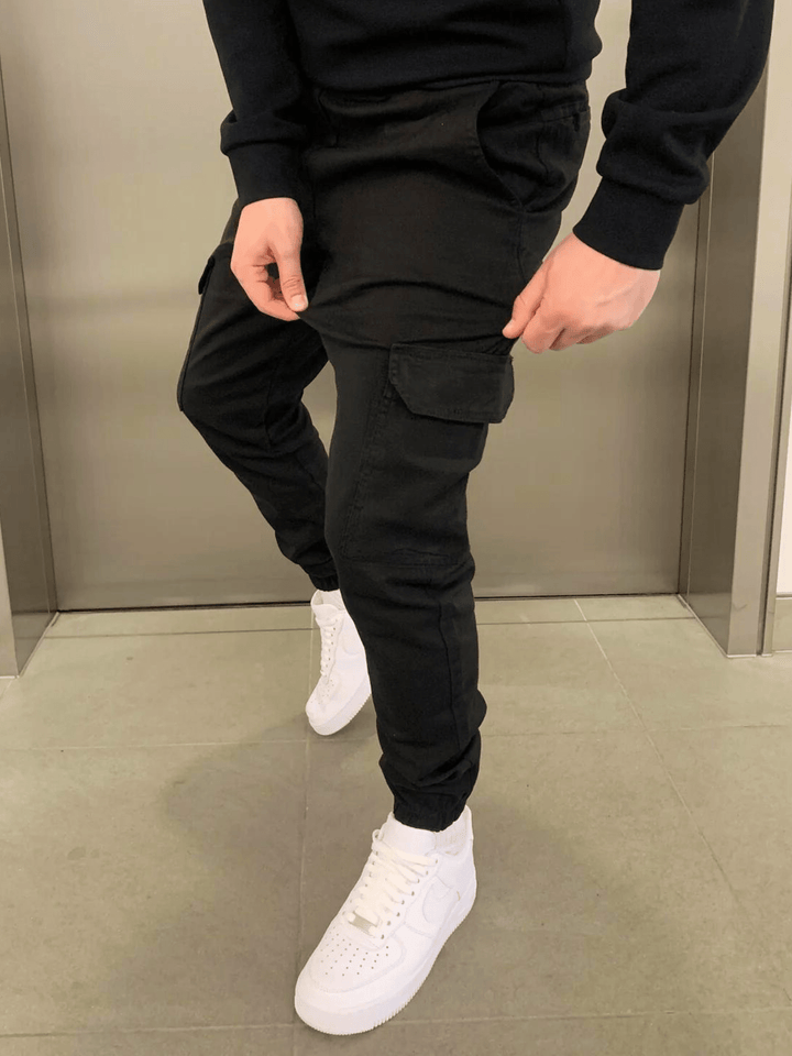 Stylish men's cargo pants with a modern tie-waist. Ideal for everyday wear and men's fashion looks.