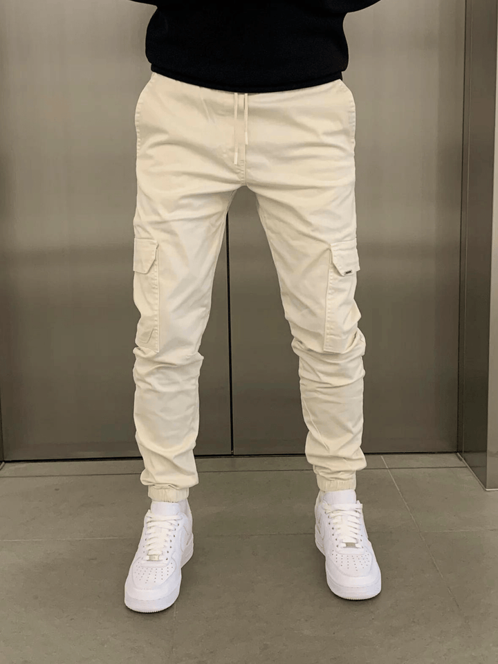 Relaxed fit men's tie-waist cargo pants, versatile for casual outings and active lifestyles.
