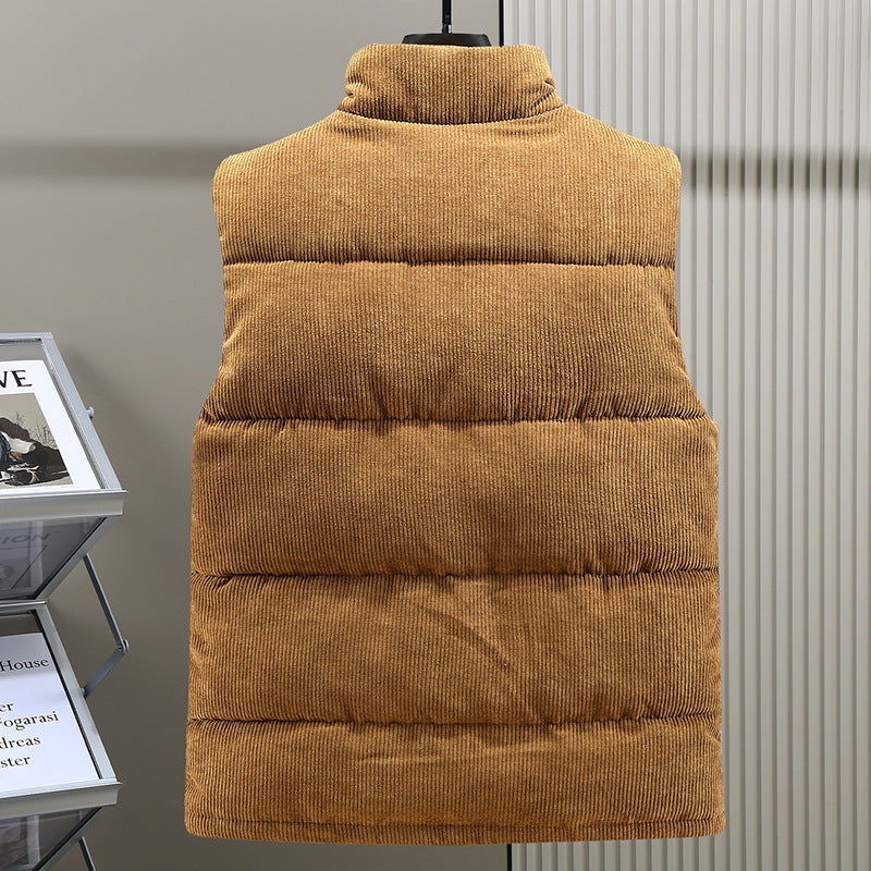Warm men's quilted puffer vest. Sleeveless design for layering in cold weather. Durable outerwear.