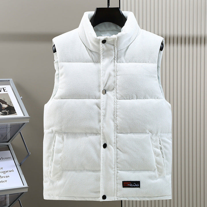 Stylish men's puffer vest. Sleeveless jacket, perfect for casual wear & winter fashion. Snap closure, stand collar.