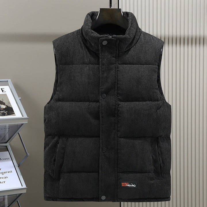 Men's sleeveless puffer vest for cold weather. Quilted, warm outerwear with a stand collar and snap closure.