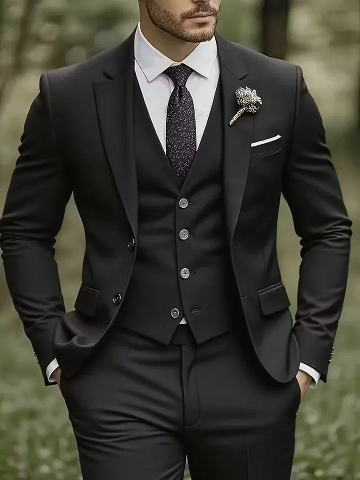 Elegant men's formal three-piece suit, slim fit, with a classic waistcoat & notched lapels.