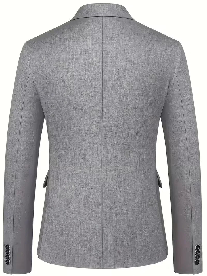 Refined men's slim fit suit, three-piece with waistcoat, notched lapels. Business or wedding.