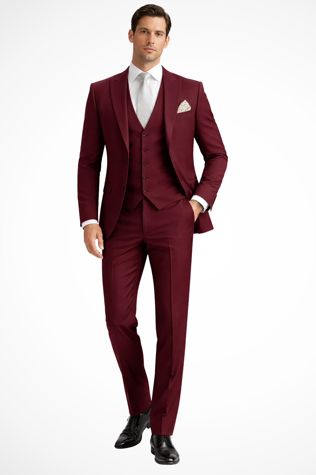 Sharp burgundy men's slim fit 3-piece suit, peak lapel. Perfect for a party or formal event.