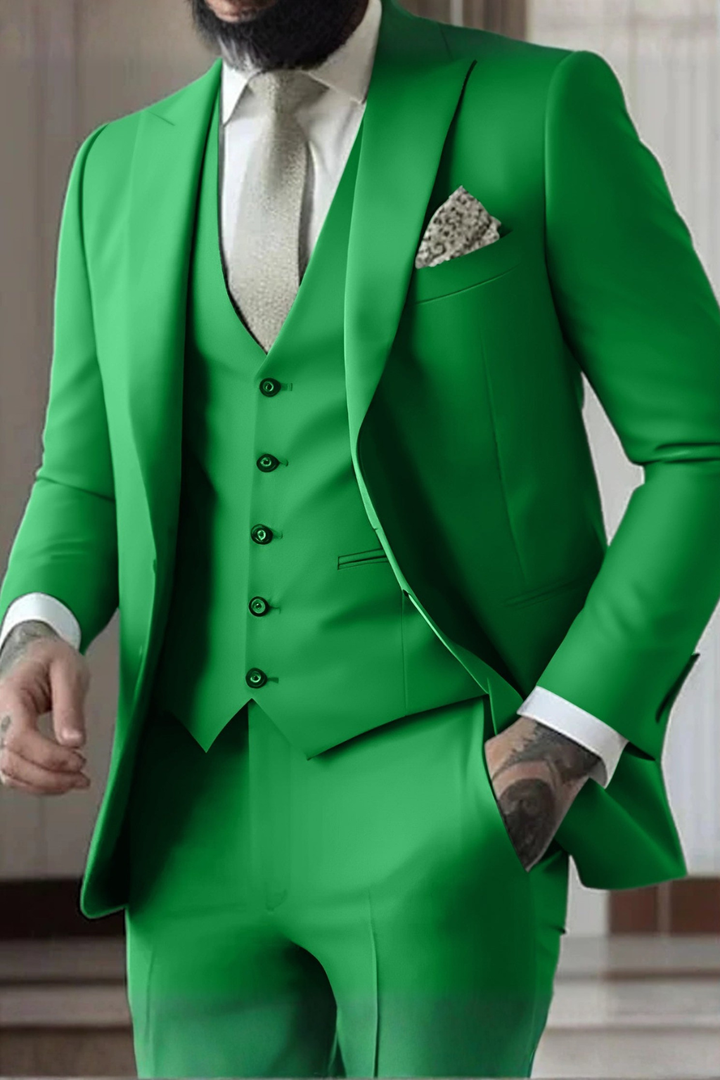Detail shot of the peak lapel on a men's slim fit three-piece suit, emphasizing sharp style.