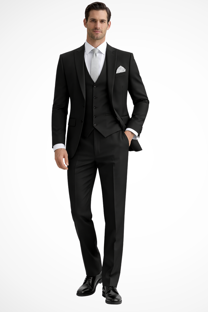 Dark navy men's slim fit suit, three pieces, featuring a sharp peak lapel for formal occasions.