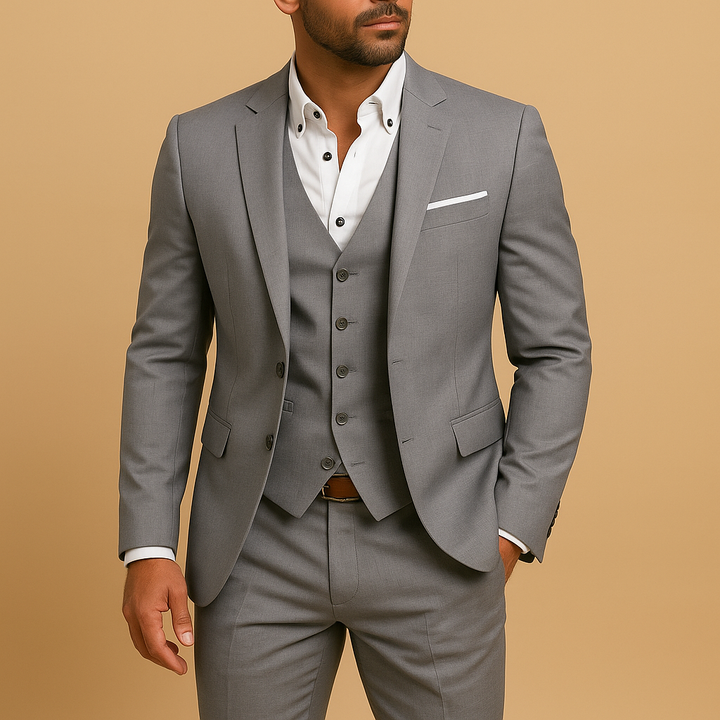 Sophisticated men's tailored 3-piece suit, featuring a stylish waistcoat and elegant pocket square.