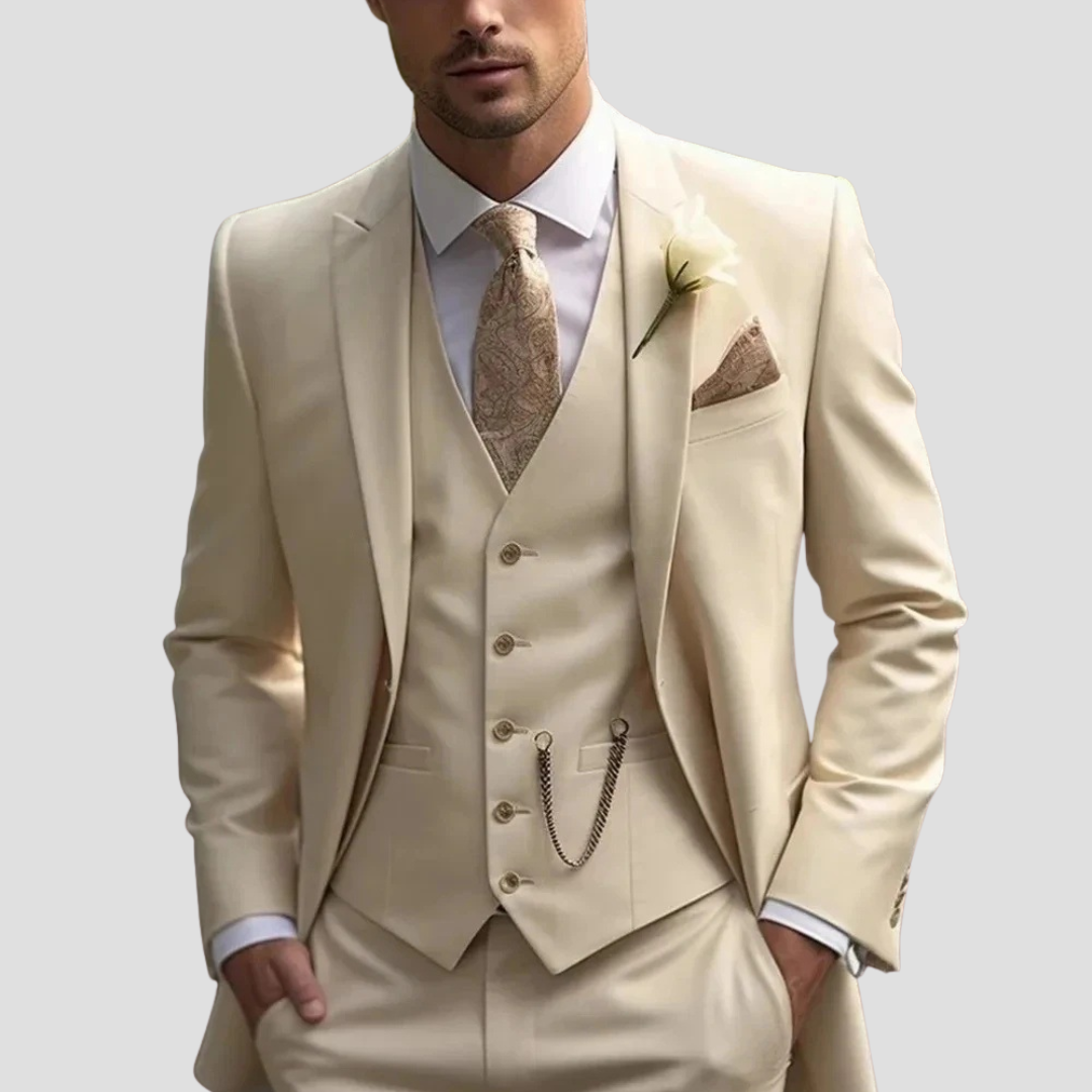 Full shot of a groom wearing a slim fit tailored formal suit for a wedding.