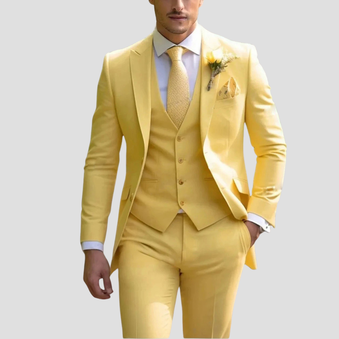 Man wearing a stylish men's three-piece suit, perfect for special occasions.