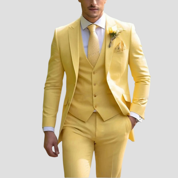 Man wearing a stylish men's three-piece suit, perfect for special occasions.