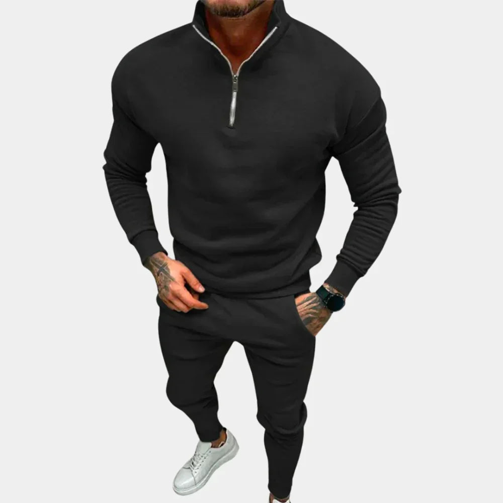 Men's slim-fit active jogging suit set, a half-zip tracksuit with elastic waist pants for gym workouts & casual wear.