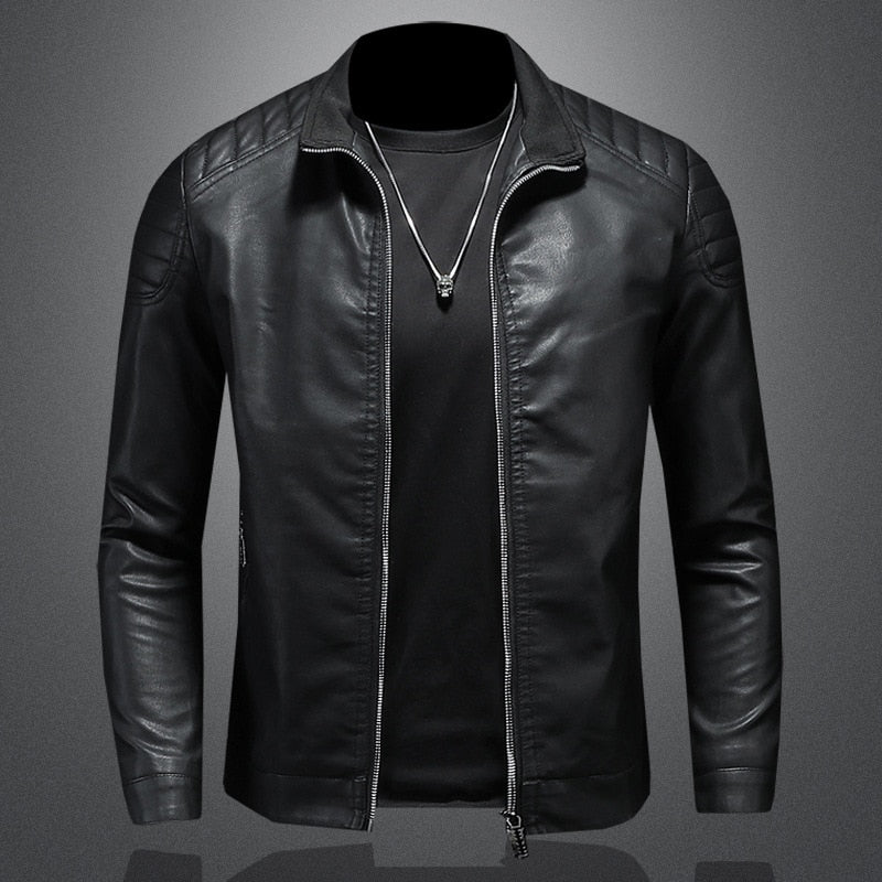 Blue men's slim-fit casual jacket with quilted shoulders, a stand collar, and modern outerwear style.