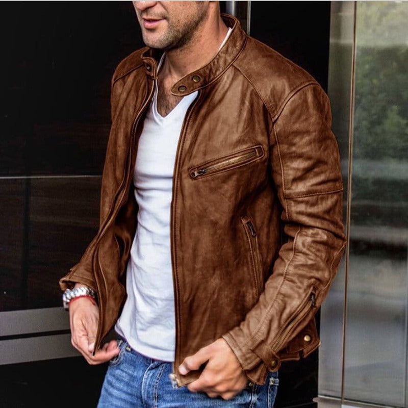 Confident men's brown slim fit moto jacket, featuring sleek modern style, zip pockets & snap collar.