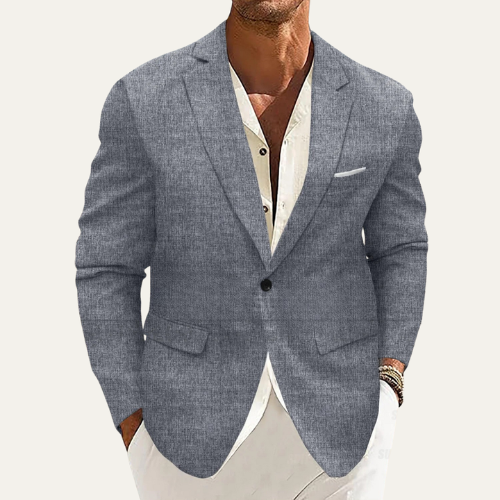 Men's slim fit blazer in a dark color, perfect for a smart casual look.