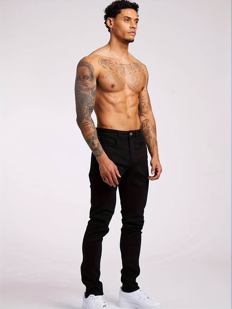 Close-up of men's slim fit blue jeans, featuring classic five-pocket detail