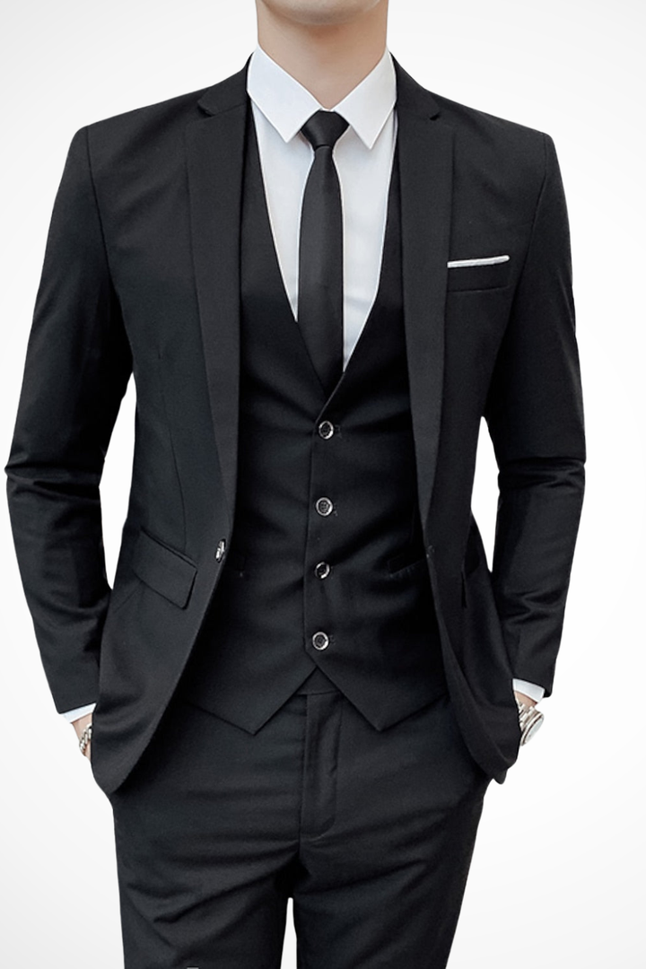 Men's formal wear: a classic black three piece suit with a refined notch lapel.