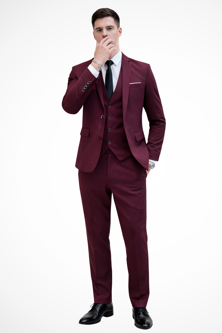 Close-up of notch lapel on a stylish men's slim fit burgundy suit.