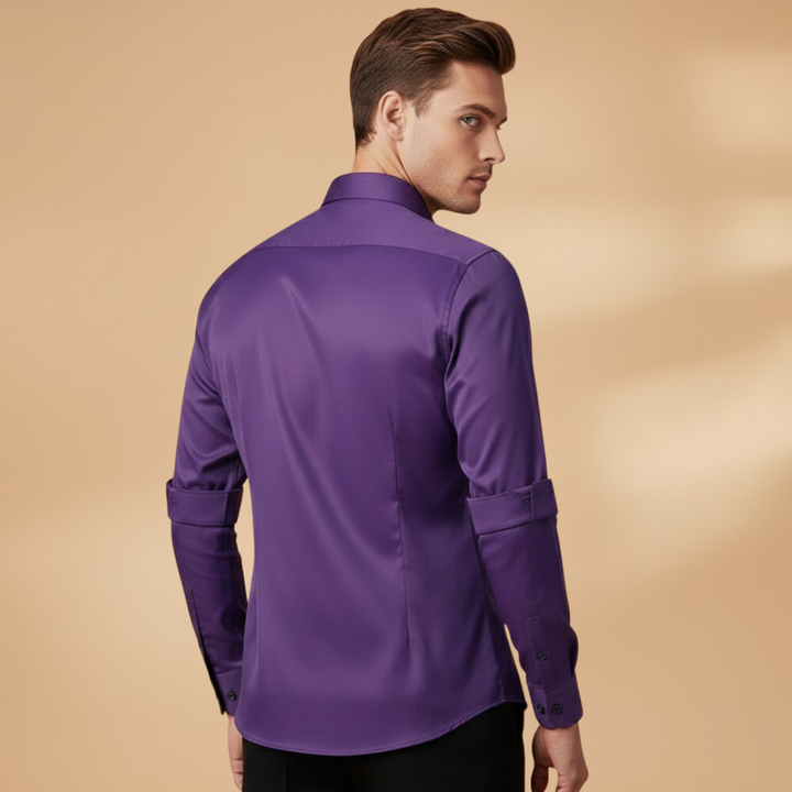 Close-up of the button detailing on a men's slim-fit shirt.