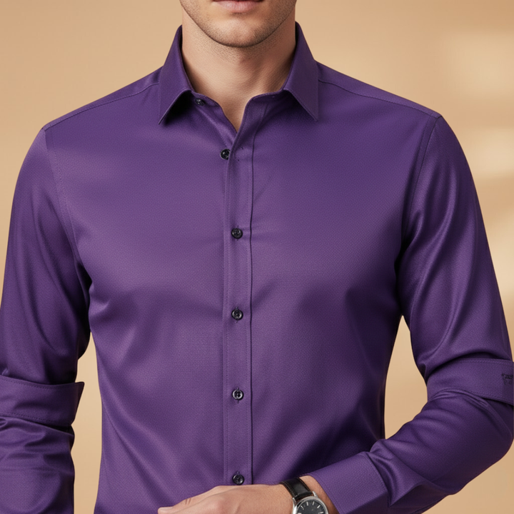 Model wearing a men's slim-fit button-down shirt for casual outings.