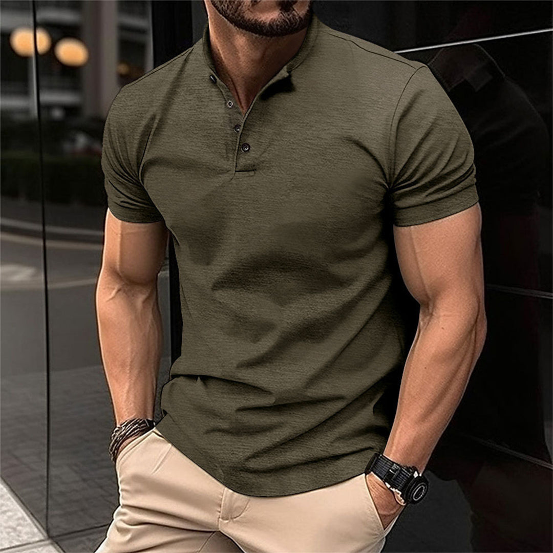 Man wearing a tailored fit button neck polo shirt, a versatile wardrobe essential