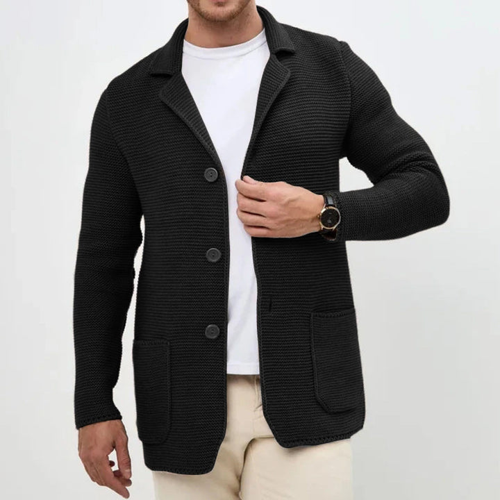Close-up of men's slim fit button-front cardigan, highlighting the quality fabric & turn-down collar detail.
