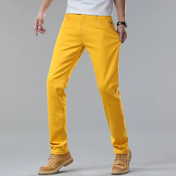 Close-up of men's dark wash slim fit denim jeans.