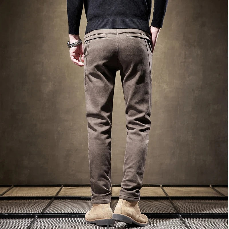 Black men's slim-fit casual pants, a modern wardrobe essential for effortless style & all-day comfort.