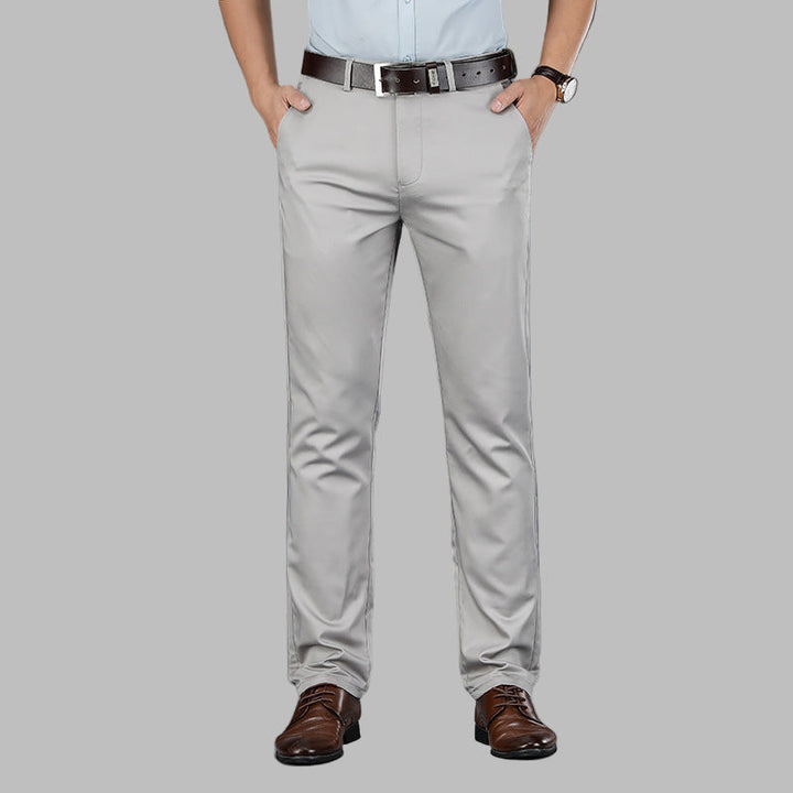 Man modeling slim fit chinos, demonstrating their comfortable fit and modern style for a smart casual appearance.