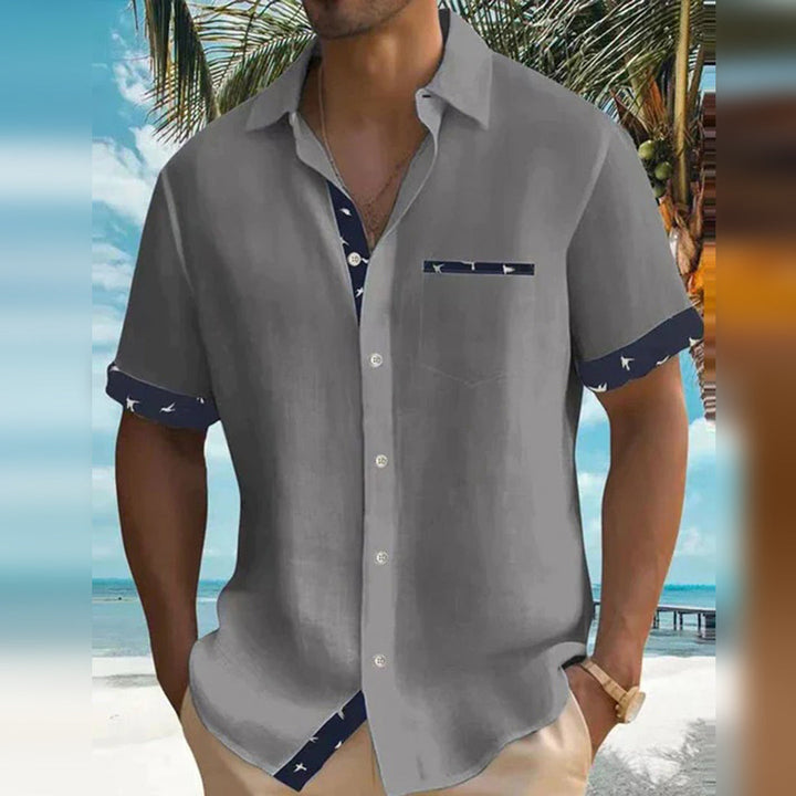 Stylish men's long sleeve button-down shirt, slim fit for a modern look, ideal for everyday fashion.