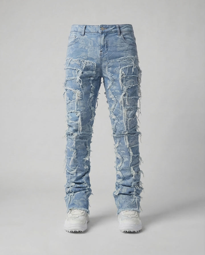 Men's slim fit destroyed jeans, a staple for streetwear and festival outfits, showcasing distressed denim.
