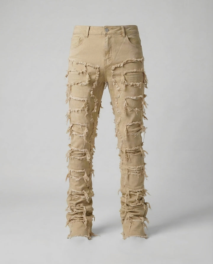 High-quality men's distressed denim slim fit jeans, combining durability with edgy urban fashion.