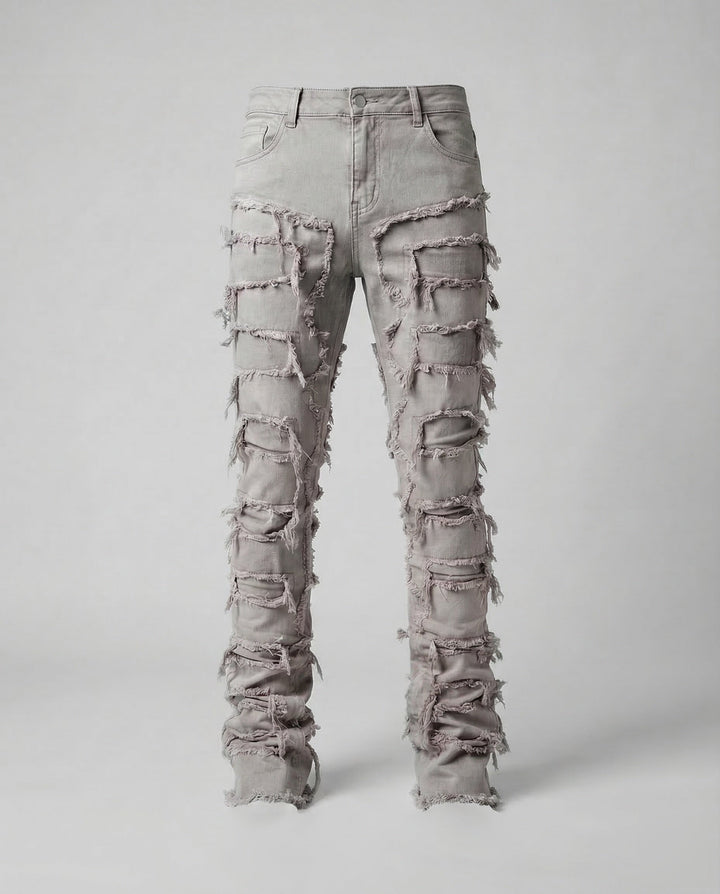 Edgy men's distressed denim jeans, slim fit, for a cool urban style & comfortable casual wear.