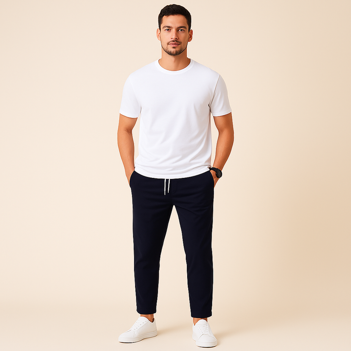 Men's slim fit drawstring pants in black, perfect for casual or athleisure wear.
