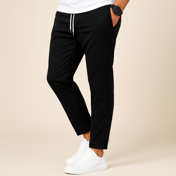 Stylish men's athleisure pants, slim fit, featuring a functional drawstring closure.