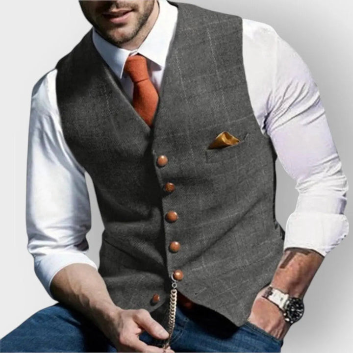 Elegant grey slim fit men's gilet with herringbone check. Versatile for formal wear, business or events.