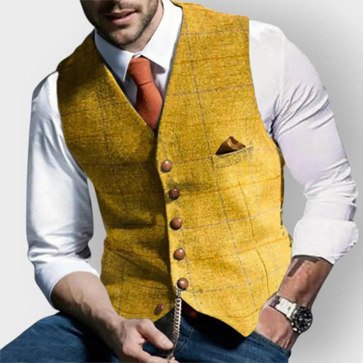 Stylish slim fit men's herringbone checked waistcoat. Features button-up front, great for formal & casual looks.