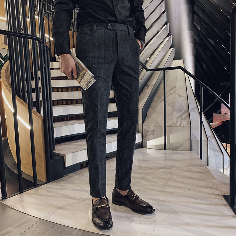 Men's slim-fit herringbone dress pants in gray, perfect for tailored business and formal wear.